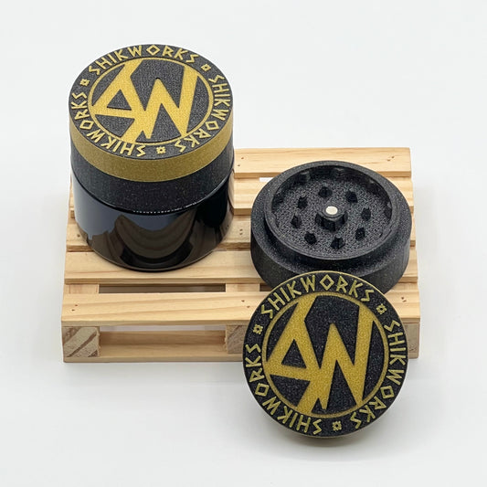 Bote grinder SW dorado/negro galaxia - Shikworks